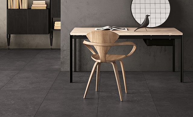 Foto: Fiandre | Fliesenserie: Fjord Moderner Raum mit Fliesen in Steinoptik, der Serie Fjord von Fiandre